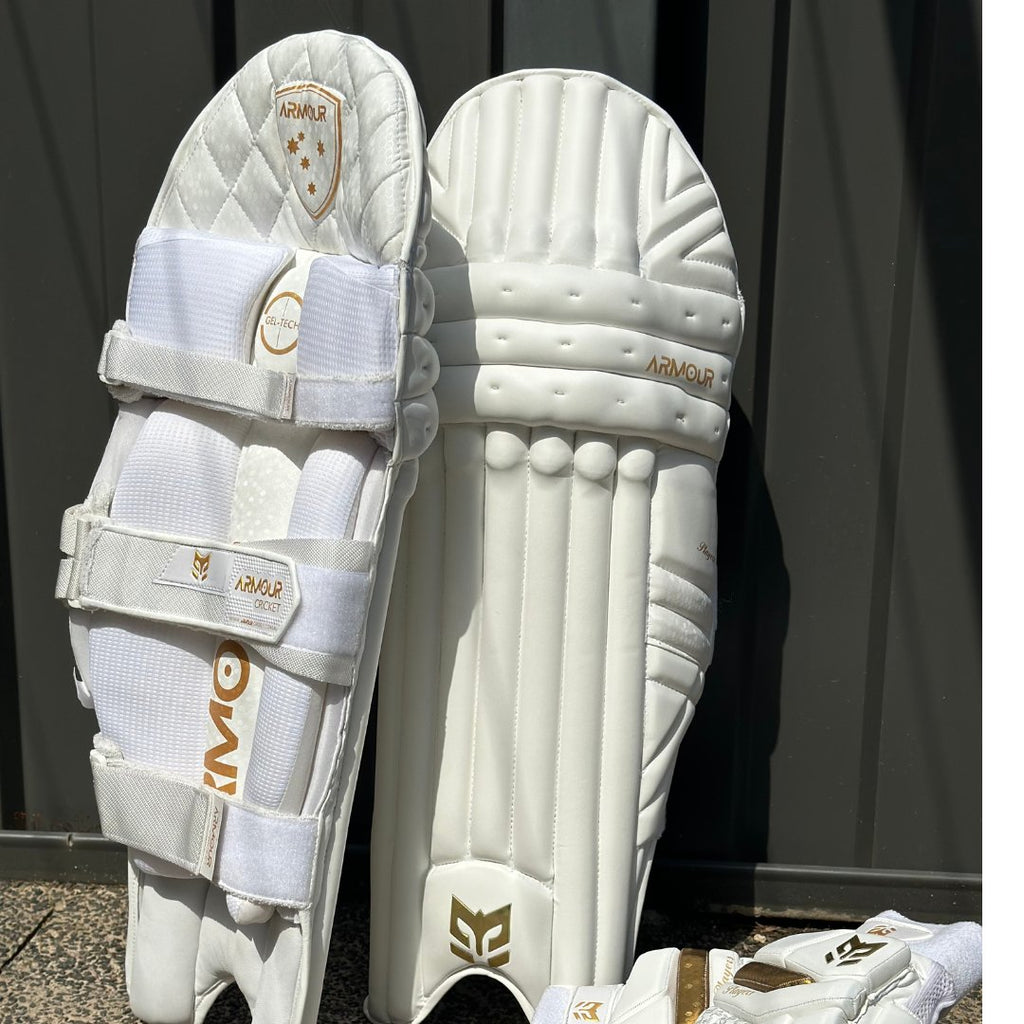 Armour Cricket Batting Leg Guard - Players Grade (White and Gold) - Leg Guard - Wiz Sports